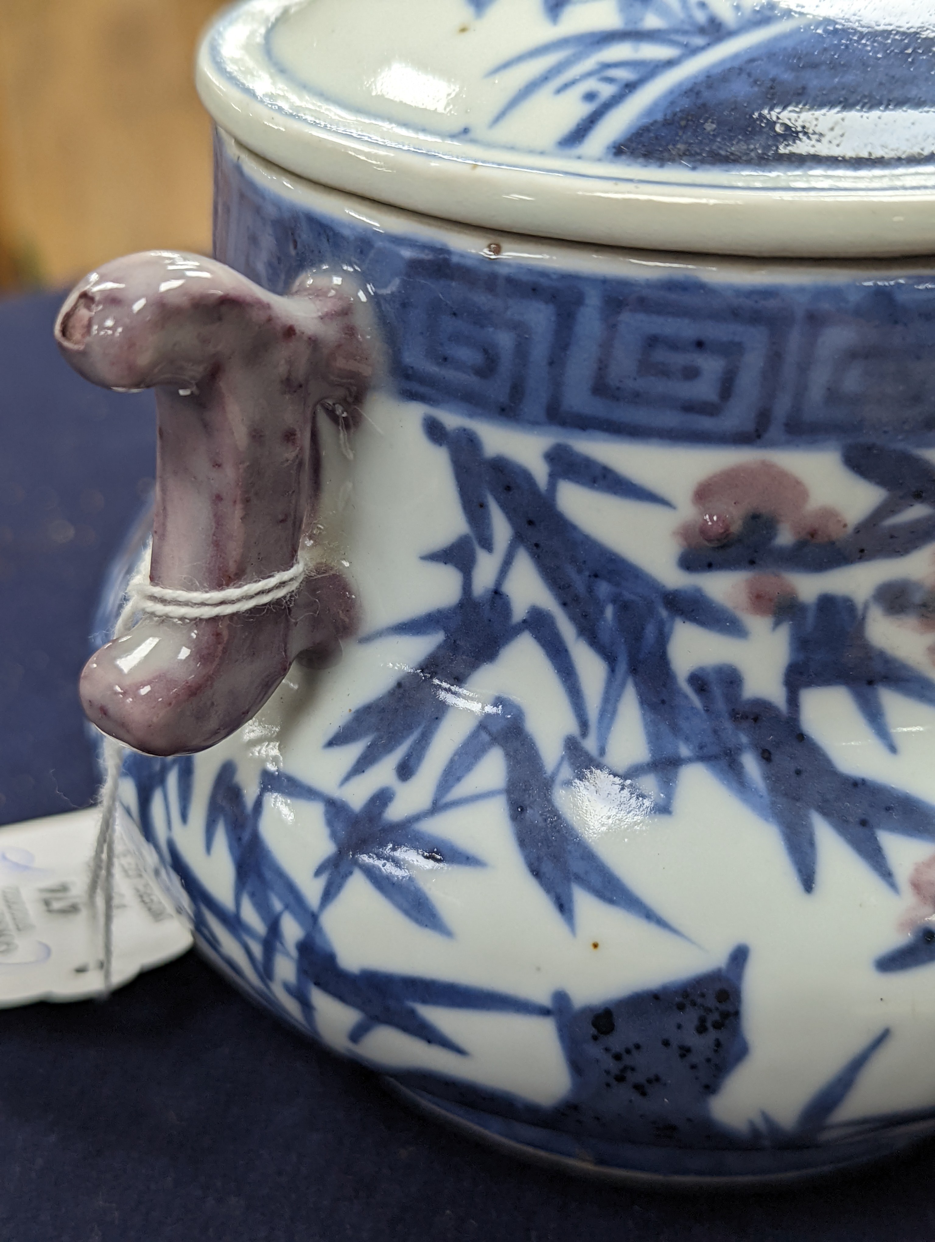 A Chinese underglaze blue and copper red jar and cover, Xuande six character mark but later 12cm